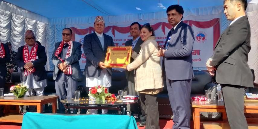 Sumnima Tuladhar, Executive Director of CWIN Nepal receiving the Letter of Appreciation